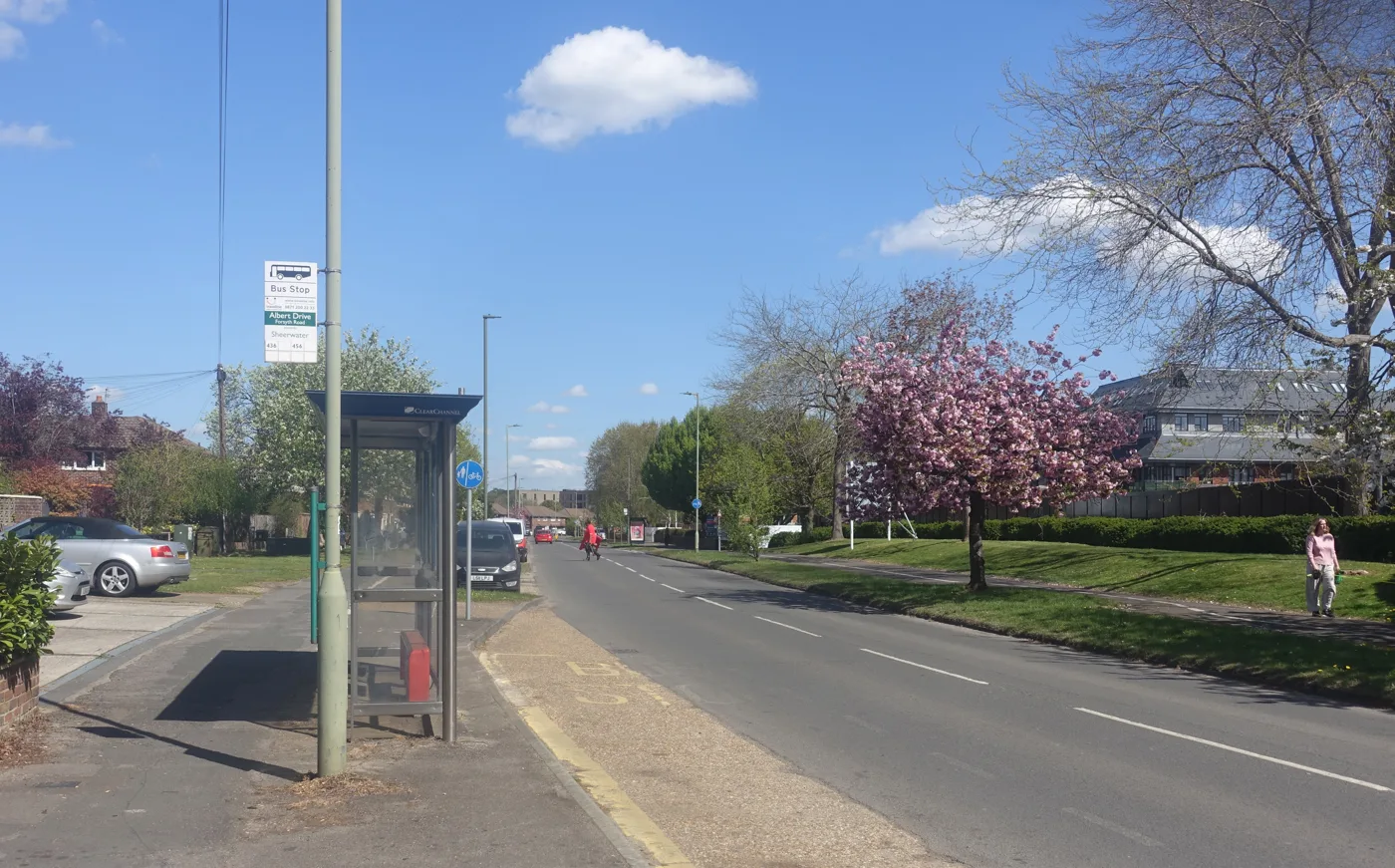 Albert Drive, Sheerwater, in April 2025, with some of the estate's new homes on the right. The Spencer Close block that would make way for the road is elsewhere on the estate.