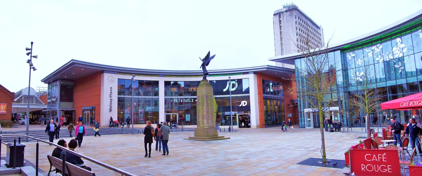 Woking town square and the borough war memorial. Remembrance Sunday is one of the civic duties the report says would end without charter trustees.