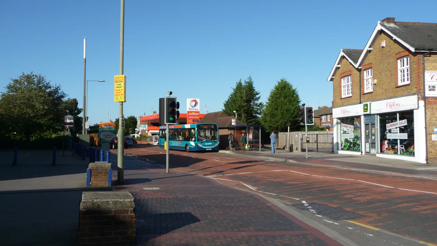 Knaphill High Street, photographed in 2009. Two of this month's new companies, a barber and a pizza takeaway, are registered in Knaphill. The photograph shows the street, not either business.